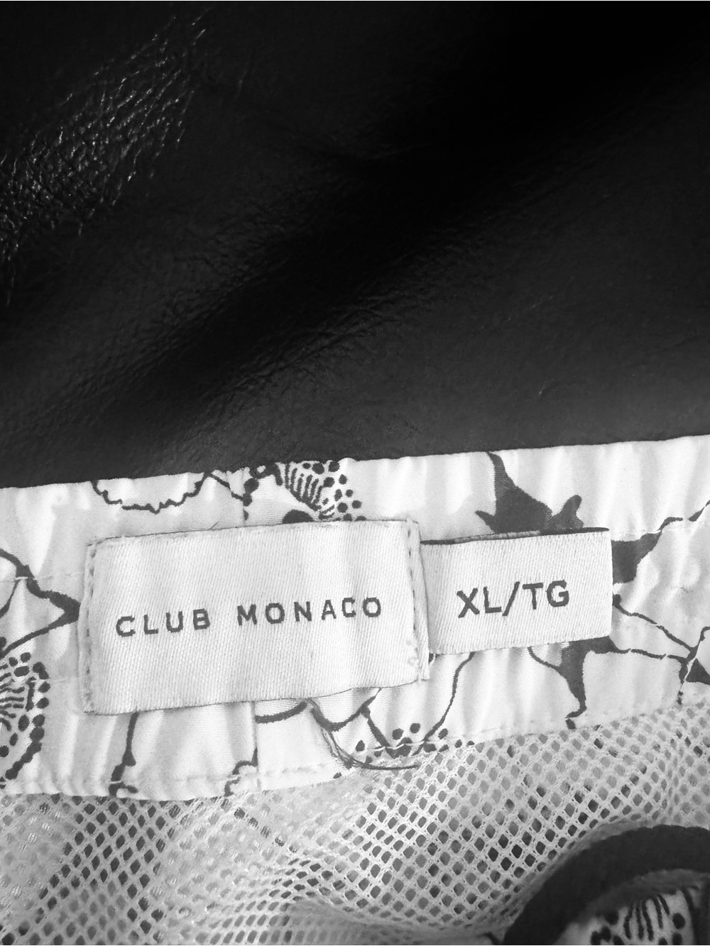 Club Monaco White and Black men’s swimsuit